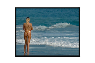 long legged beauty watching the surf