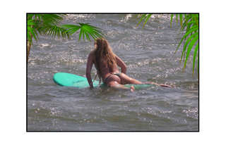 surfer girl showing off her stuff