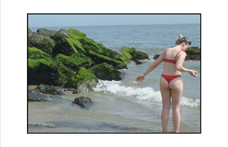 girl in thong swimsuit collecting seashells