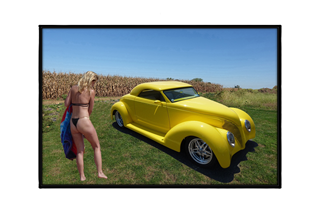 yellow vintage car with girl in bikini