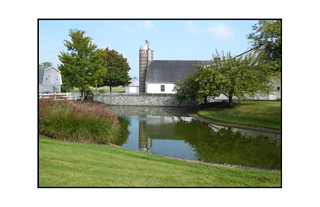 silo barn pond reflection