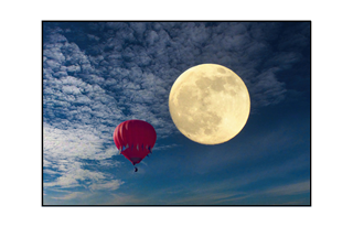 balloon floating toward the moon