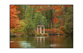 autumn scene with gazebo and boat