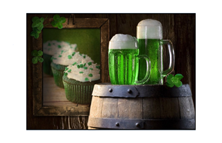 irish green beer on barrel and cupcakes