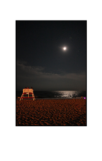 night on the beach with lifeguard bench