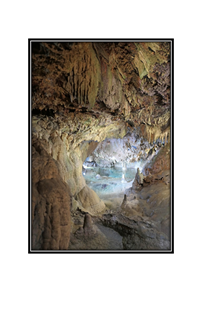 aqua blue pool of water in cave