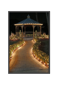 lit up path leading to lighted gazebo